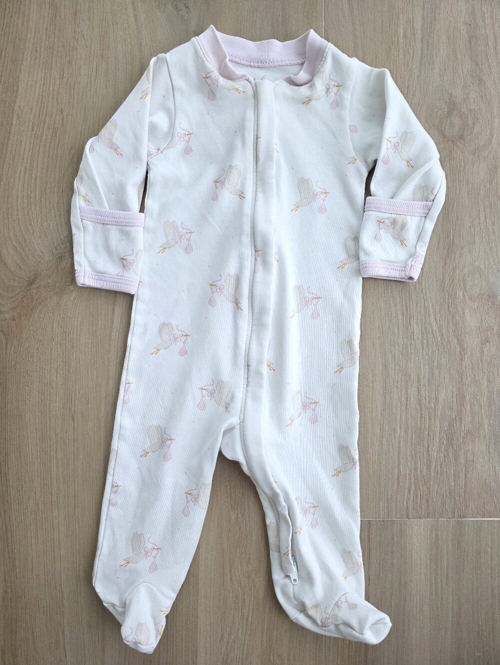 Caprilina Newborn Footie Pajamas | Soft Pink Stork Print